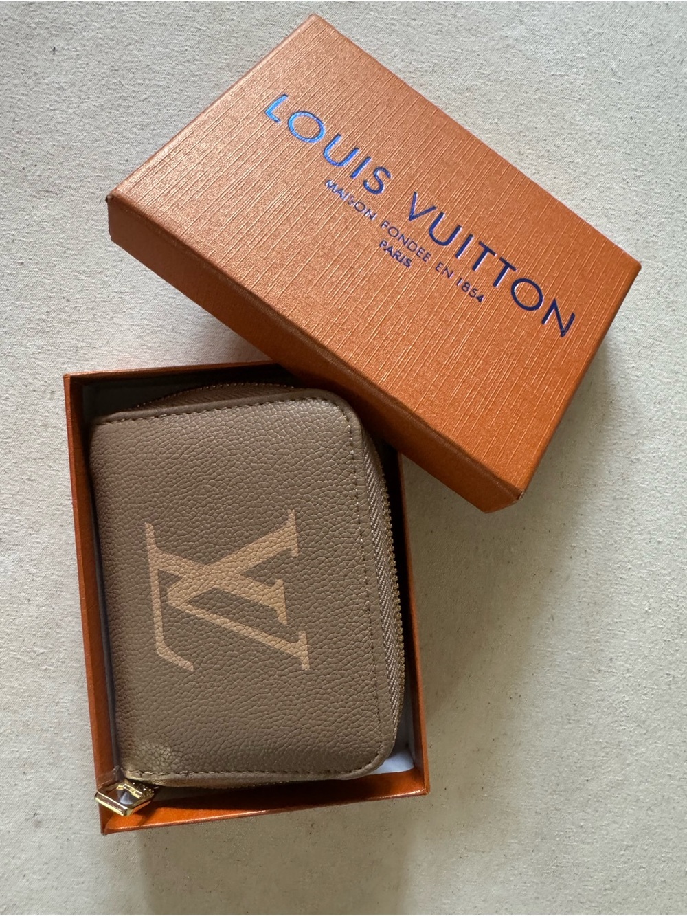 Louis Vuitton Gold-Tone Zipper Pull Wallet Accent